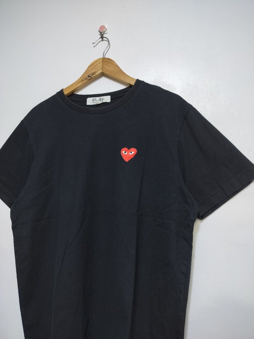 Play CDG Black T-Shirt (patch) (Category: Tshirts & Polo Shirts ) located in Taguig. Submitted by thriftybounce (Listing ID 1470034587, Image 2). Description: Fit : M Width : 22 Length : 26.5 Color Rate : 9.5/10 Issue : Pinholes, Cut washtag.