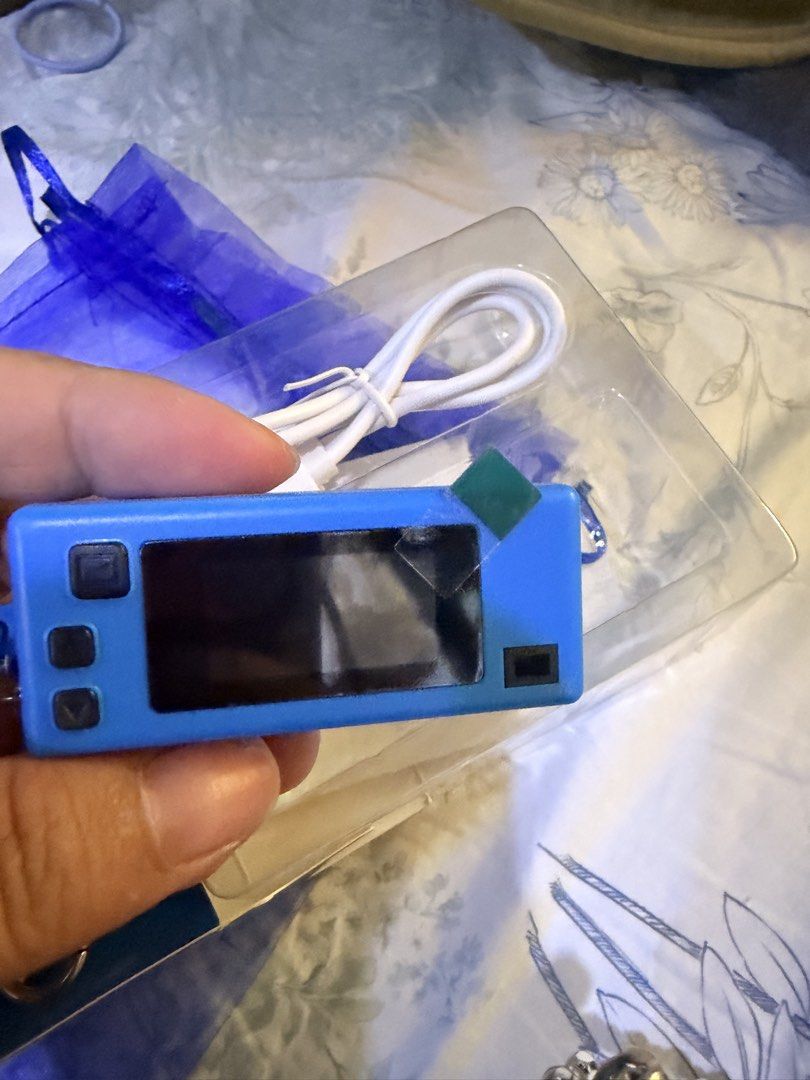 Playground Camera Thumb Key Chain blue (Category: Cameras) located in Quezon City. Submitted by cozykath (Listing ID 1469954035, Image 3). Description: Key Features & Specifications • Ultra-Compact Design: A pocket-sized, lightweight camera designed to be used as a keychain or backpack charm. • Rear Display: Features a small 0.96-inch color TFT LCD screen on the back for real-time image preview and menu navigation. • Video & Audio: Capable of rec