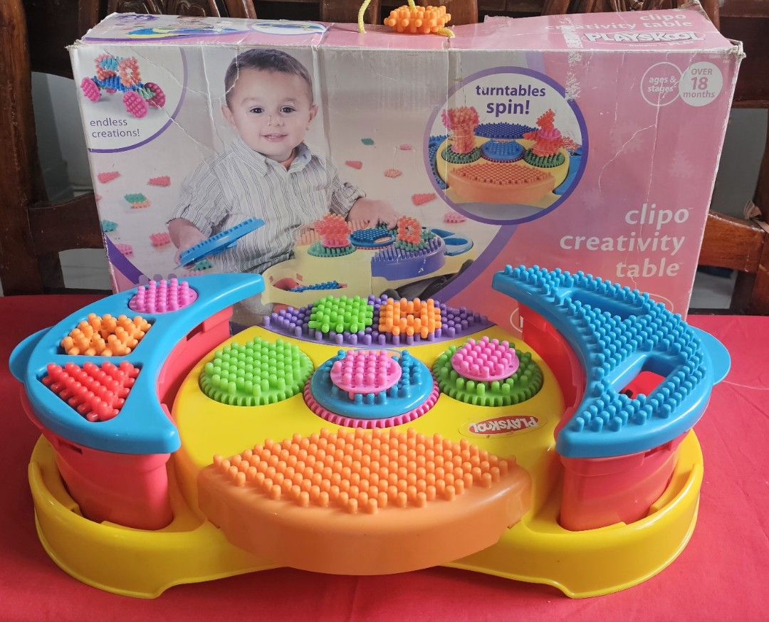 Playskool Clipo Creativity Table (Category: Educational & Learning Toys) located in San Jose del Monte. Submitted by stellarbeauty (Listing ID 1469979354, Image 1). Description: - Brand: Playskool Clipo Creativity Table - Recommended Age: 18 months and up - Features: Colourful activity station, spinning turntables, and textured building pieces - Development: Great for imaginative play and fine motor skills - Condition: Good, includes original box