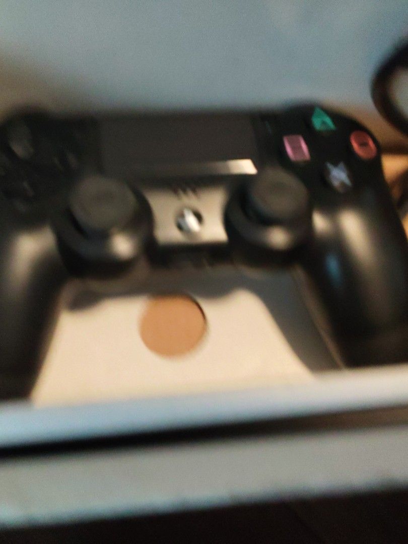 PlayStation 4 Console Bundle with Controller and Two Games (Category: PlayStation) located in Caloocan City. Submitted by cooldragon_0358ac (Listing ID 1469953040, Image 3). Description: PlayStation 4 console packed in original box. Includes one black DualShock 4 controller, power cable, and two games. FIFA 14 and Assassin's Creed IV Black Flag included. Everything stored properly in the cardboard insert. Great setup for gaming right away. (Price