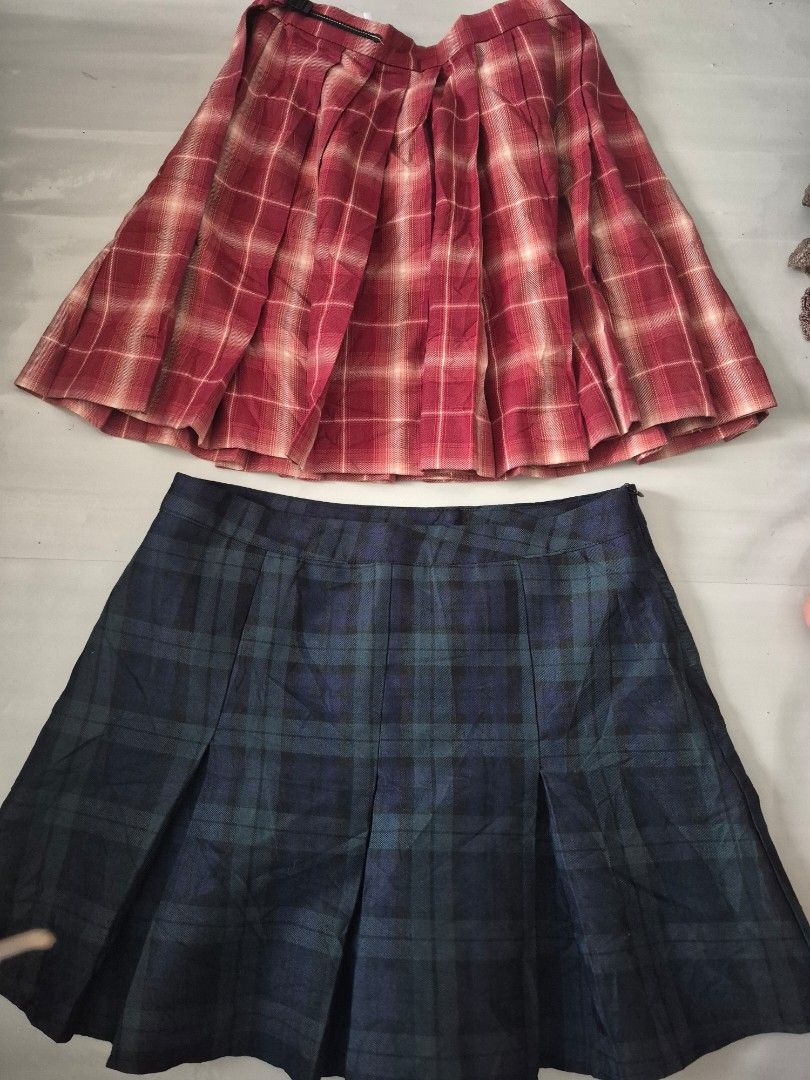 Pleated Skirts Green/Navy Checkered & Red Plaid (Category: Skirts) located in Calamba. Submitted by bb.lace (Listing ID 1469962753, Image 1). Description: 150 ea -navy has washable stain, can be washed by seller if not rushed -no issue on red skirt -both have thick heavy fabric but only navy has safety shorts.