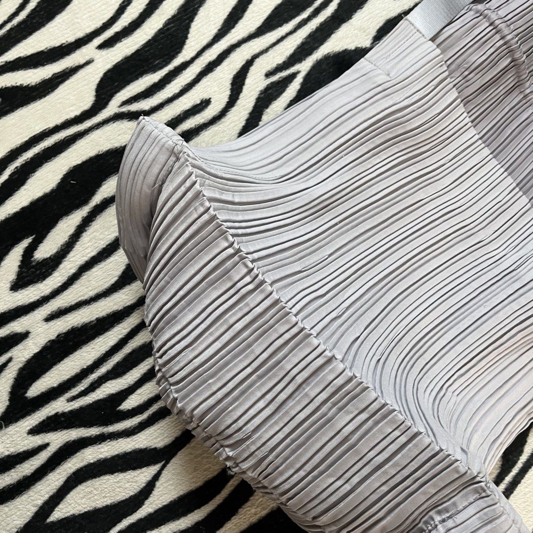 Pleats please drawstring bag (Category: Tote Bags) located in Manila. Submitted by royaldripmanila (Listing ID 1470047368, Image 2). Description: No issue W13 L15.
