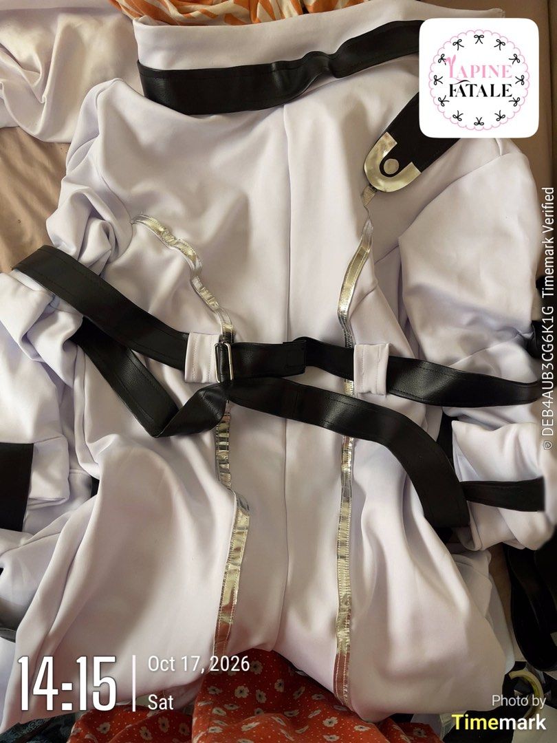 PLUS SIZE COSPLAY 3XL CODE GEASS CC PRISONER VER (Category: Jumpsuits) located in Bacolod City. Submitted by mariowos (Listing ID 1470002462, Image 1). Description: - Style: White one-piece cosplay costume - Details: Attached black belts and metallic silver trim - Sleeves: Long sleeves included - Material: Smooth synthetic fabric - Condition: Clean, with all hardware buckles intact Includes Dokidoki Wig Unstyled Brand New.