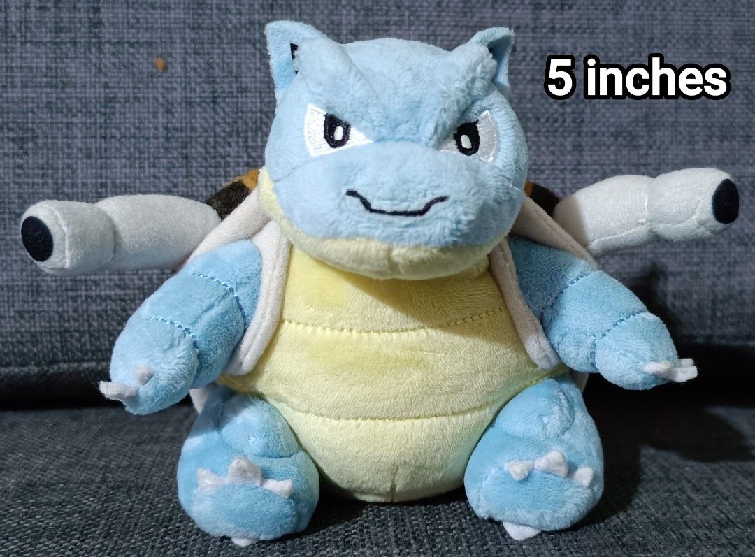 Pokémon Center Pokémon Fit Blastoise Plush (Category: Plushies & Soft Toys) located in San Pedro. Submitted by max__collectibles (Listing ID 1470127668, Image 1). Description: - Authentic Pokémon Center Pokémon Fit Blastoise plush - Size: Approx. 5 inches tall - Details: Features a brown shell, dual shoulder water cannons, and stitched facial features - Tags: Original tush tags attached with 2018 manufacturing date - Condition: Clean, vibrant col