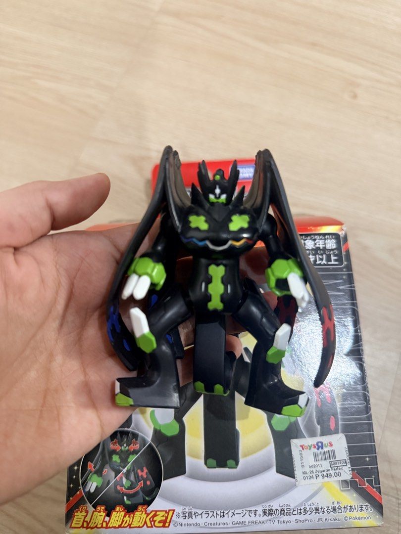 Pokémon ML-26 Zygarde Perfect Forme Figure (Category: Figurines & Statues) located in Pasay City. Submitted by anndrias (Listing ID 1470097642, Image 2). Description: No issue; stored perfectly well - Brand: Takara Tomy (Monster Collection ML-26) - Character: Zygarde Perfect Forme - Size: Approx. 4 inches tall - Features: Poseable head, arms, and legs - Condition: Brand new, unopened in original box - Bonus: Original Toys "R" Us price sticker att