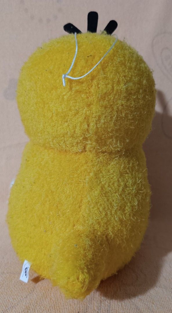 Pokémon Psyduck Plush (Category: Plushies & Soft Toys) located in San Pedro. Submitted by max__collectibles (Listing ID 1470127156, Image 2). Description: - Official Banpresto Psyduck plush toy - Sleeping design with soft yellow fabric, white beak, and feet - Size: Approximately 11 inches tall - Features a black string loop on top for easy hanging - Perfect for Pokémon fans and collectors!.