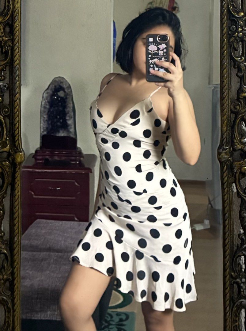 Polka Dot Cami Dress (Category: Dresses) located in Tanauan. Submitted by theitgirlsdibs4 (Listing ID 1470055763, Image 1). Description: - Cream slip dress with cute black polka dots - Flattering V-neckline with adjustable spaghetti straps - Chic wrapped front bodice and fitted waist - Fun, flared uneven ruffled hemline - Convenient hidden back zipper closure - EUC, stylish, and ready to wear!.