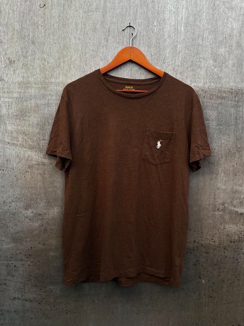 Polo Ralph Lauren Brown Pocket Tee (Category: Tshirts & Polo Shirts ) located in Talisay. Submitted by justindanielle17 (Listing ID 1470139798, Image 2). Description: -Original -20 x 27 dimensions -Good as new condition -10/10 Color rate -No flaws - Brand: Polo Ralph Lauren - Style: Pocket t-shirt with classic crew neck - Color: Brown with a nice heathered texture - Size: M (Tag on collar) - Material: Comfortable cotton blend - Details: White emb