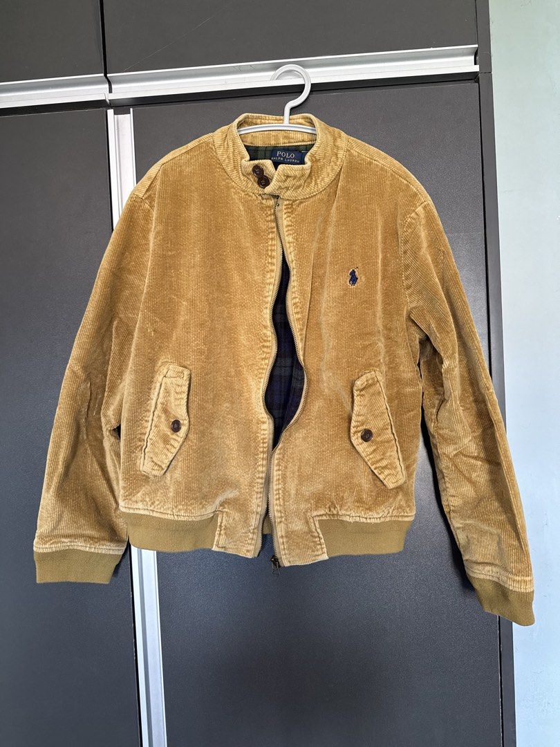 Polo Ralph Lauren Corduroy Jacket (Category: Coats, Jackets and Outerwear) located in Dasmarinas. Submitted by akelvin23 (Listing ID 1470112376, Image 1). Description: Not sure of the origin so I'm NOT selling it as original. - Brand: Polo Ralph Lauren - Item: Tan Corduroy Harrington Jacket - Size: Small - Details: Full zip front, buttoned mock neck, ribbed hem & cuffs, front button flap pockets - Branding: Iconic blue embroidered pony logo on ch