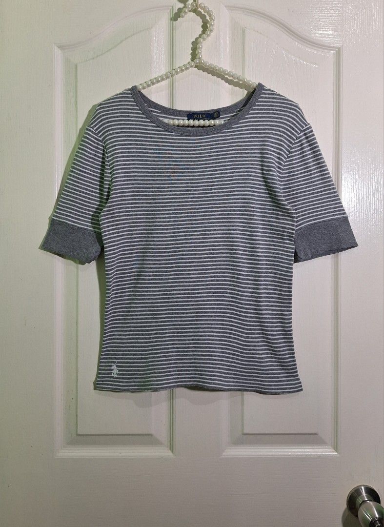 Polo ralph lauren embroidered logo stripe top small - medium (Category: Shirts) located in San Pablo. Submitted by allyourbrandedneeds (Listing ID 1470139405, Image 2). Description: - Brand: Polo Ralph Lauren - Item: Striped t-shirt - Color: Grey and white with solid grey cuffs - Size: S - Material: Soft cotton blend - Details: Classic crew neckline and small white embroidered pony logo near the bottom hem - Condition: Great casual basic piece fo