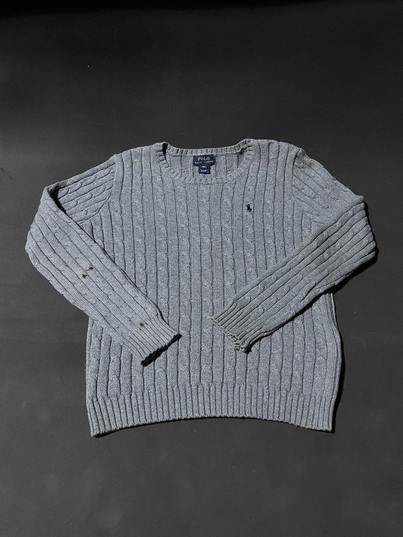 Polo Ralph Lauren Gray Cable Knit Sweater (Category: Longsleeves) located in Andop. Submitted by outclickz_00 (Listing ID 1470119957, Image 1). Description: - Brand: Polo Ralph Lauren - Color: Gray - Size: Small 17/22 - Material: Wool/cotton blend with classic cable knit texture - Design: Crewneck, long sleeves, ribbed cuffs, and signature embroidered pony logo - Condition: Clean with standard light wear around the neckline and cuffs - Perfect fo