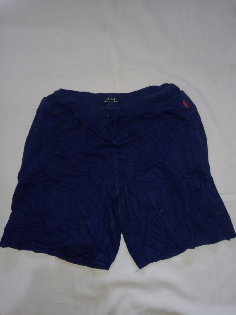 Polo Ralph Lauren Navy Blue Shorts (Category: Shorts) located in Bansalan. Submitted by christiann21 (Listing ID 1469999048, Image 1). Description: - Brand: Polo Ralph Lauren - Color: Navy blue - Material: Soft, comfortable cotton - Features: Elastic waistband with adjustable drawstring, iconic red embroidered pony logo - Best for: Lounging, sleeping, or casual everyday wear.