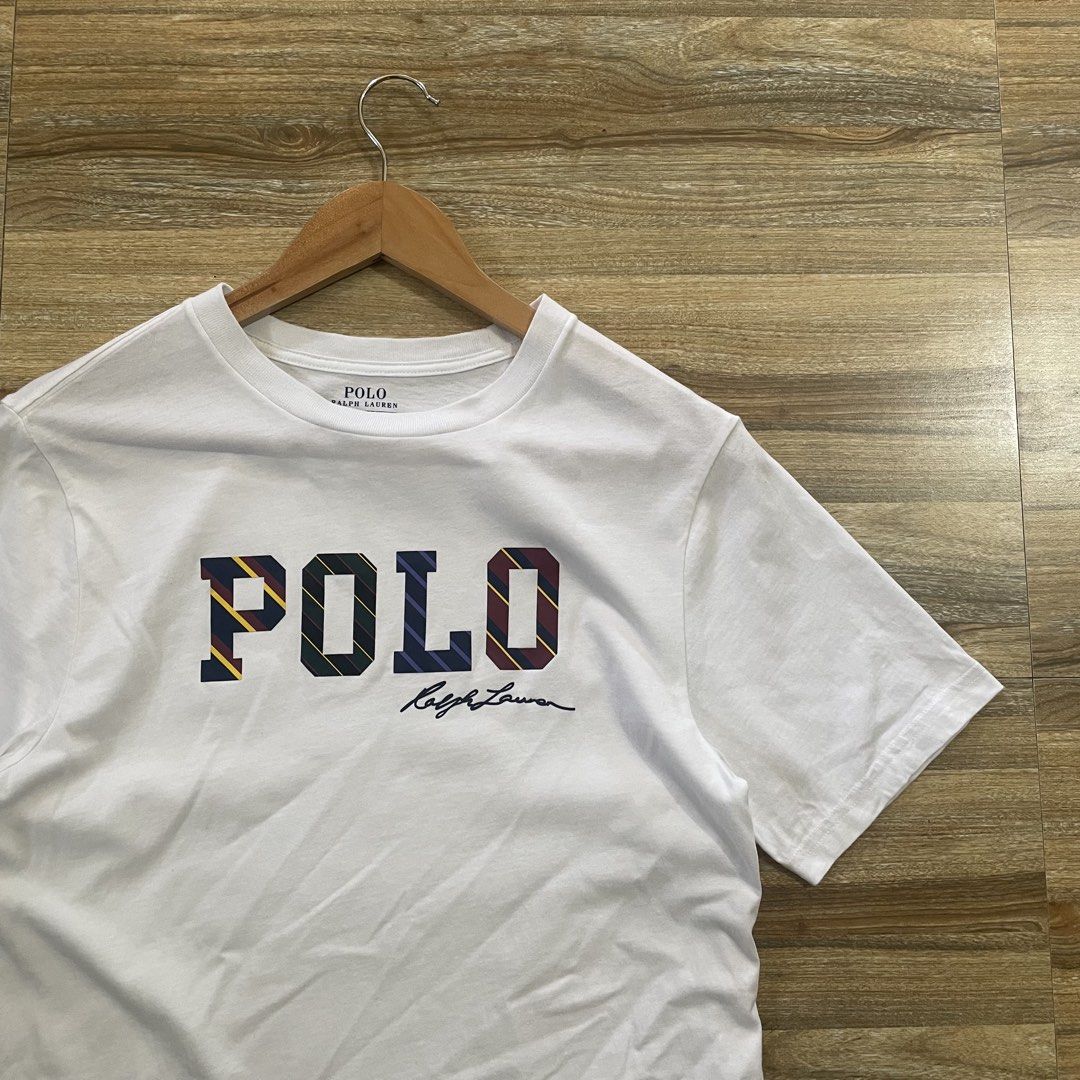 Polo Ralph Lauren White Graphic Tee (Category: Tshirts & Polo Shirts ) located in Cebu City. Submitted by trashloots.ceb (Listing ID 1469971206, Image 2). Description: RALPH LAUREN ‼️ AS NEW Size: LARGE YOUTH W 18/ L 27 COLORATE 9.5/ 10 ISSUE : ❌❌❌ PRICE + SF🛒🛒 📍CEBU , SAN FERNANDO 🚚 J&T EXPRESS.