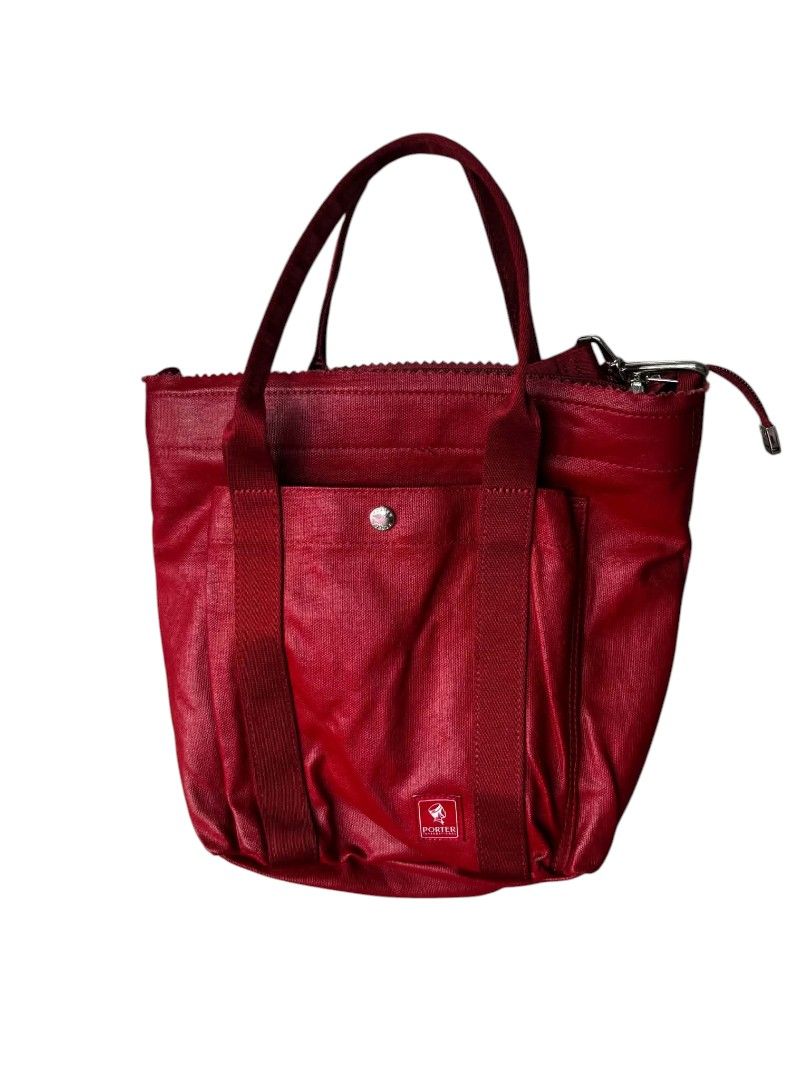 Porter International Puff 2way Bag (Category: Sling Bags) located in Manila. Submitted by jp-luxury (Listing ID 1470040938, Image 2). Description: 21-29 cm width, 27 cm height, 10 cm Depth.