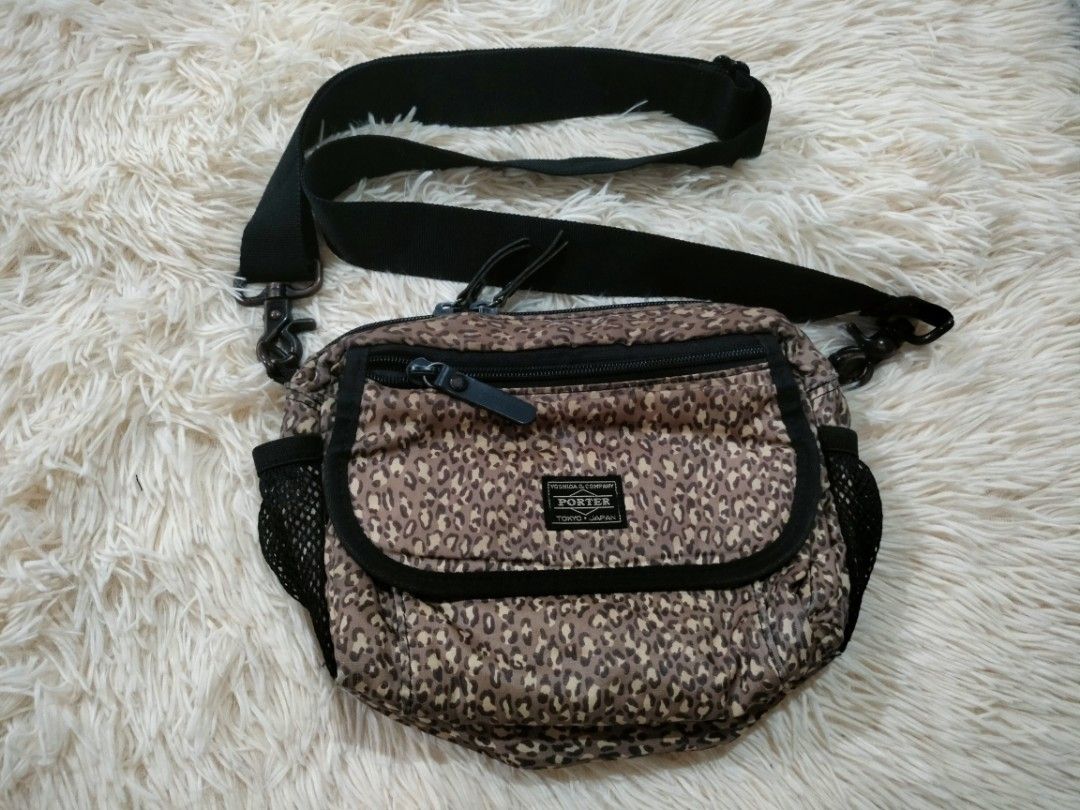 Porter Yoshida & Co Leopard Print Crossbody Bag (Category: Belt bags, Clutches and Pouches) located in Abucay. Submitted by naixrazion199x (Listing ID 1469984882, Image 1). Description: 2WAY PORTER BAG‼️ 2k+sf 9/10 condition sign of usage pwede vouch or vcall para safe 📍bataan ship via j&t .