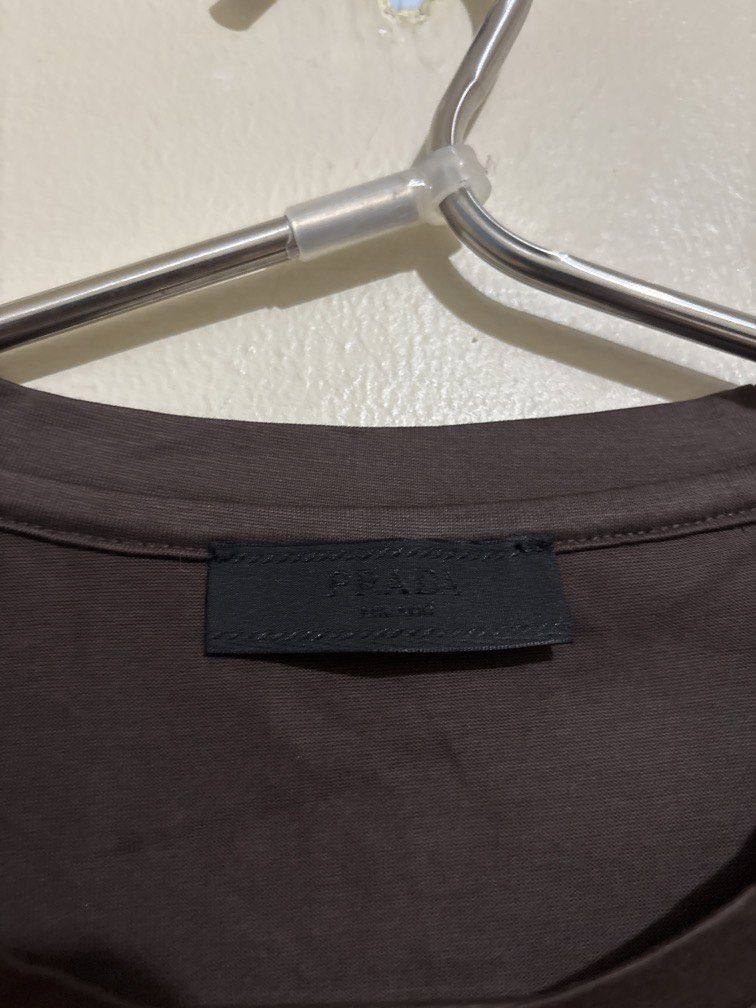 Prada Crewneck Longsleeves (Category: Coats, Jackets and Outerwear) located in Muntinlupa City. Submitted by owrayttttt (Listing ID 1470112487, Image 3). Description: - Prada Crewneck Longsleeves - Dimes is 22x28 - Like new condition - No issue - Complete tags - Free shipping via j&t.