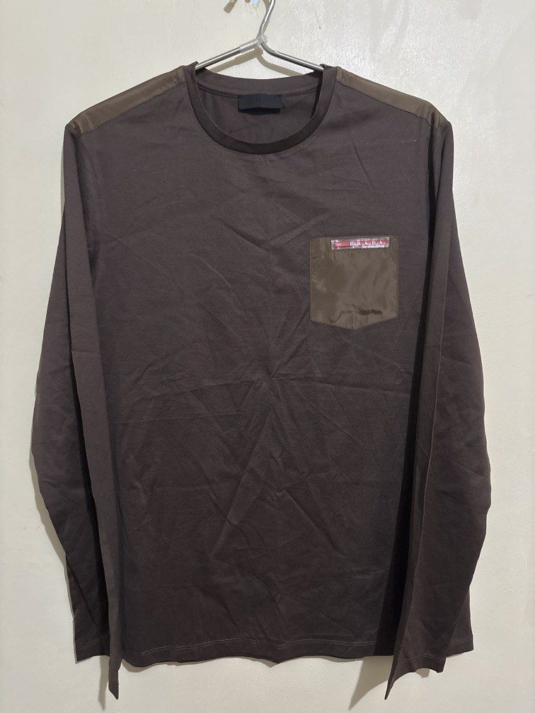 Prada Crewneck Longsleeves (Category: Coats, Jackets and Outerwear) located in Muntinlupa City. Submitted by owrayttttt (Listing ID 1470112487, Image 1). Description: - Prada Crewneck Longsleeves - Dimes is 22x28 - Like new condition - No issue - Complete tags - Free shipping via j&t.