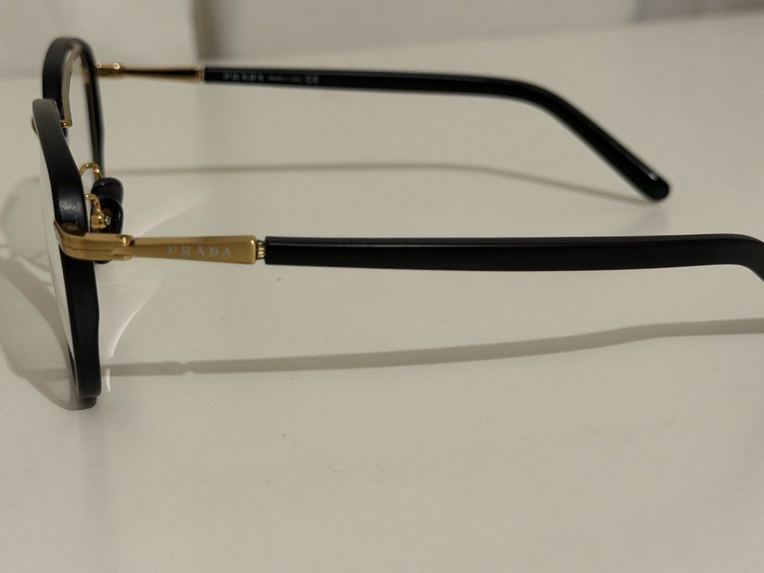Prada Eyeglasses Black and Gold Aviator Frame (Category: Sunglasses & Eyewear) located in Quezon City. Submitted by preppy15 (Listing ID 1470117768, Image 3). Description: Brand New Prada Frame Black with gold hardware.
