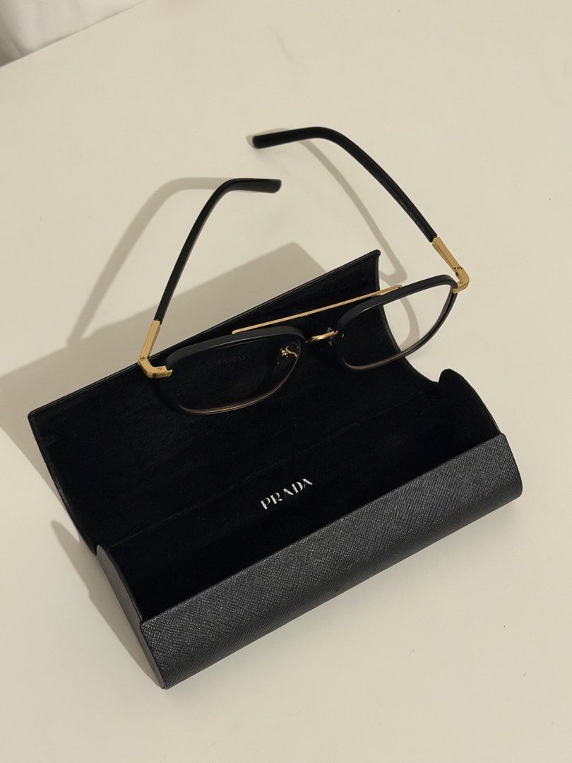 Prada Eyeglasses Black and Gold Aviator Frame (Category: Sunglasses & Eyewear) located in Quezon City. Submitted by preppy15 (Listing ID 1470117768, Image 2). Description: Brand New Prada Frame Black with gold hardware.