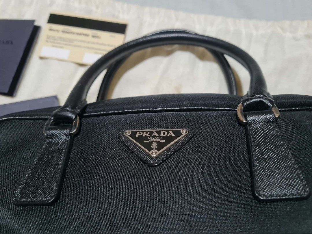 PRADA NYLON SAFFIANO BAUELETTO (Category: Luxury Bags & Wallets) located in Manila. Submitted by lowxuries (Listing ID 1470106036, Image 3). Description: PRADA BAULETTO NYLON SAFFIANO BRAND NEW AUTHENTIC WITH CARDS AND DUST BAG NEVER BEEN USED! 25K.