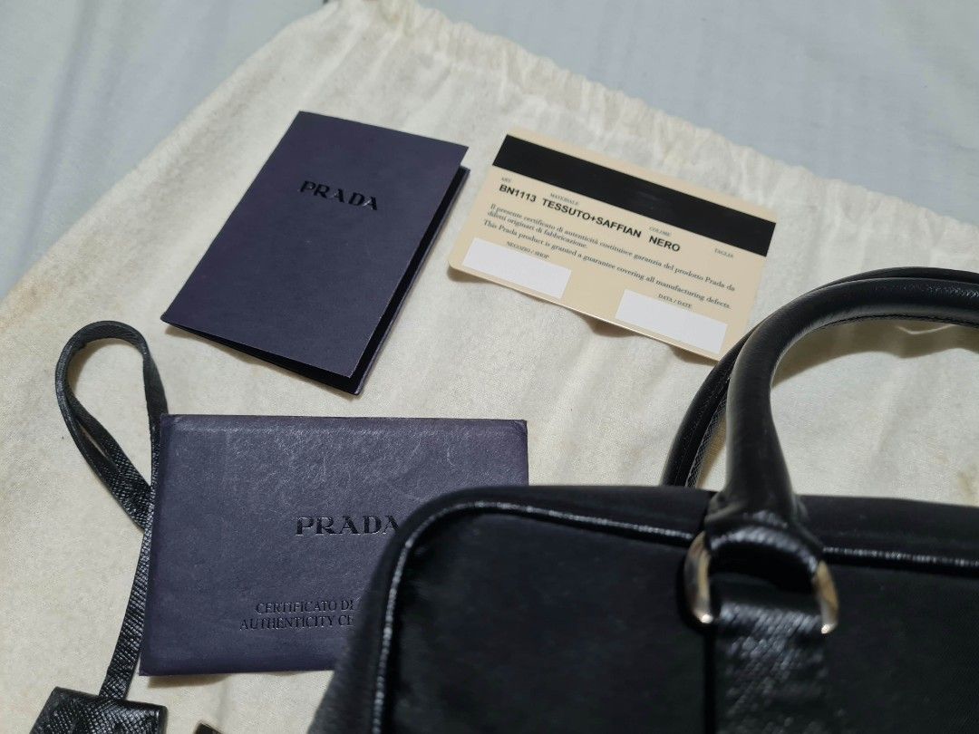 PRADA NYLON SAFFIANO BAUELETTO (Category: Luxury Bags & Wallets) located in Manila. Submitted by lowxuries (Listing ID 1470106036, Image 2). Description: PRADA BAULETTO NYLON SAFFIANO BRAND NEW AUTHENTIC WITH CARDS AND DUST BAG NEVER BEEN USED! 25K.
