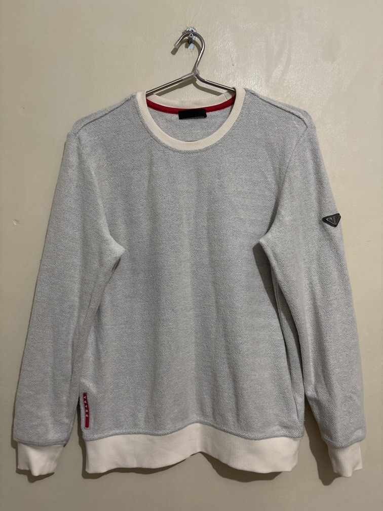 Prada Pullover (Category: Coats, Jackets and Outerwear) located in Muntinlupa City. Submitted by owrayttttt (Listing ID 1470126821, Image 1). Description: - Prada Pullover - Medium on tag - Dimes is 21x27 - complete tags - No issue - Free shipping via j&t.