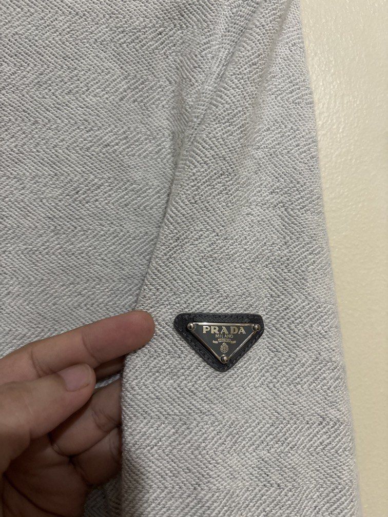 Prada Pullover (Category: Coats, Jackets and Outerwear) located in Muntinlupa City. Submitted by owrayttttt (Listing ID 1470126821, Image 2). Description: - Prada Pullover - Medium on tag - Dimes is 21x27 - complete tags - No issue - Free shipping via j&t.