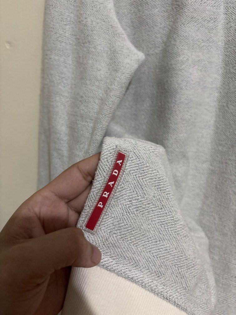 Prada Pullover (Category: Coats, Jackets and Outerwear) located in Muntinlupa City. Submitted by owrayttttt (Listing ID 1470126821, Image 3). Description: - Prada Pullover - Medium on tag - Dimes is 21x27 - complete tags - No issue - Free shipping via j&t.