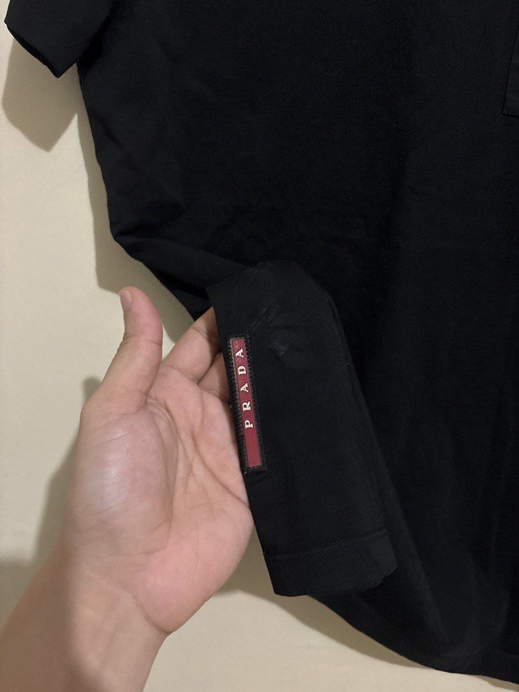 Prada shirt (Category: Formal Shirts) located in Muntinlupa City. Submitted by owrayttttt (Listing ID 1470099690, Image 3). Description: - Prada shirt - Complete tags - Dimes is 21x27 - with minor flaw (3rd photo) - Complete tags - Free shipping via j&t.