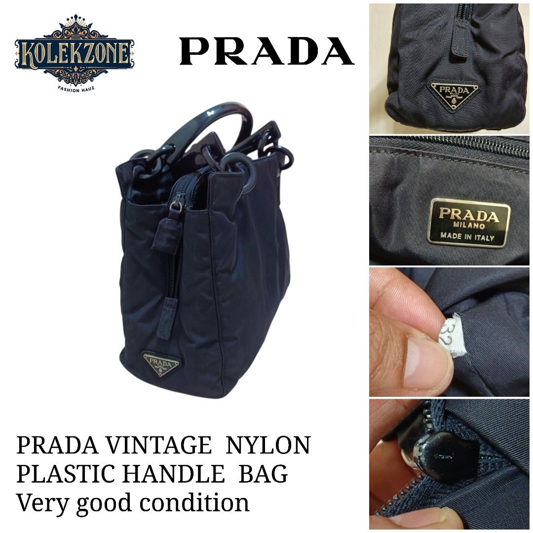 PRADA Vintage Nylon Plastic Handle Bag (Category: Luxury Bags & Wallets) located in Nasugbu. Submitted by staffpicks1515 (Listing ID 1470092732, Image 1). Description: - Authentic vintage Prada nylon bag in classic black - Durable structured shape with sturdy plastic handles and ring links - Secure zip-top closure and clean interior with zip pocket - Features iconic triangular Prada logo and interior Milano plaque with factory tag - Retro everyda