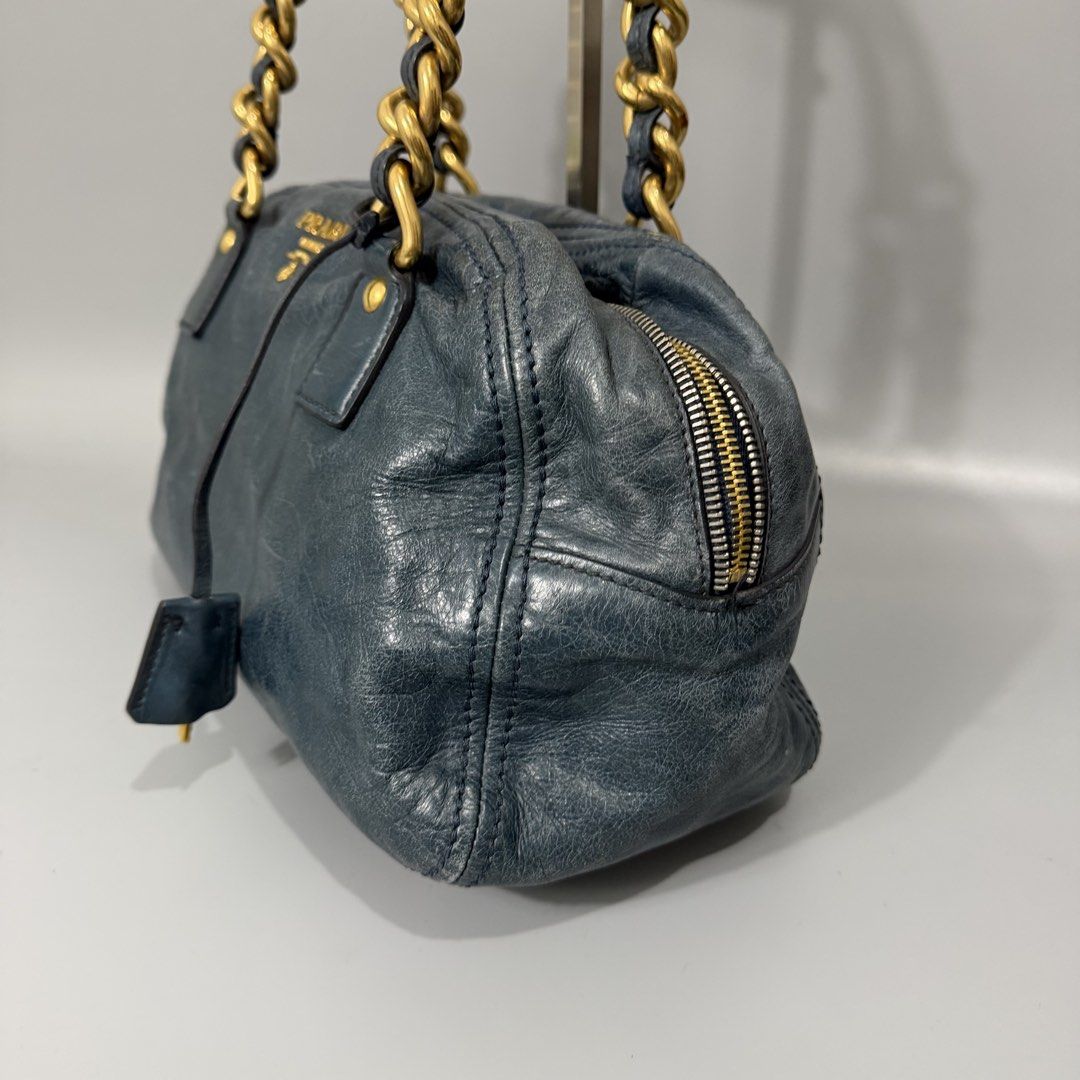 Prada Vitello Handbag (Category: Luxury Bags & Wallets) located in Manila. Submitted by astron_15 (Listing ID 1470004108, Image 3). Description: Authentic prada Color Teal Blue Rank AB no issue Complete lock set.