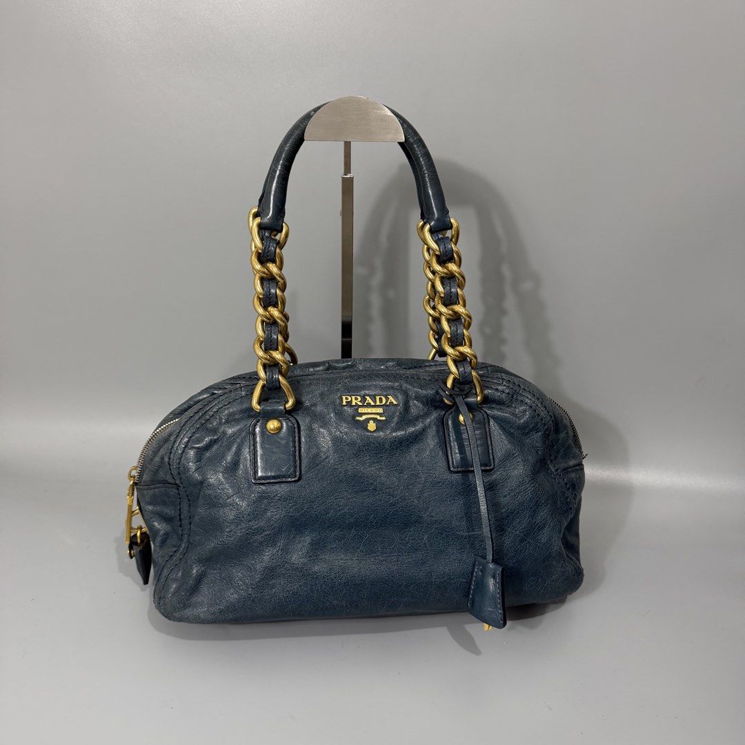 Prada Vitello Handbag (Category: Luxury Bags & Wallets) located in Manila. Submitted by astron_15 (Listing ID 1470004108, Image 1). Description: Authentic prada Color Teal Blue Rank AB no issue Complete lock set.