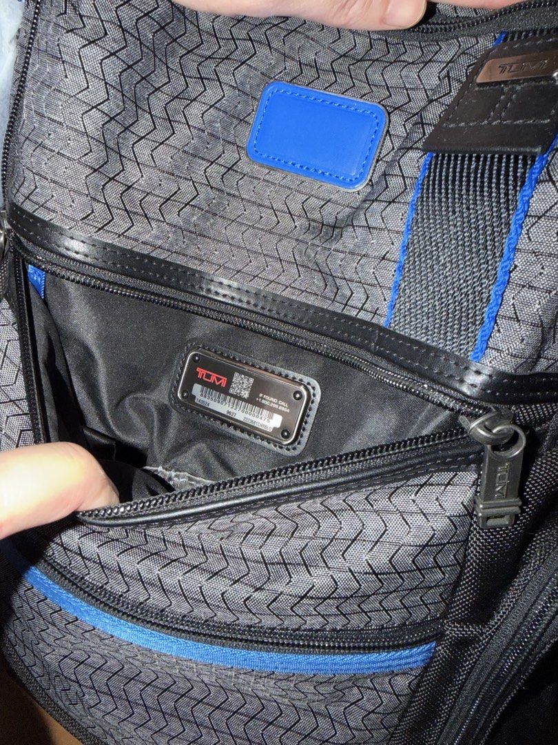 Pre-loved Authentic TUMI Backpack Gray with ultra Blue (Category: Backpacks) located in Quezon City. Submitted by janabl (Listing ID 1470053916, Image 3). Description: - Pre-loved Authentic TUMI Parrish Backpack, in Charcoal Gray with Ultra Blue accents. - Stylish gray patterned fabric with vibrant blue accents and durable leather trim - Multiple front zip compartments for easy organization - Spacious main interior with dedicated organization poc