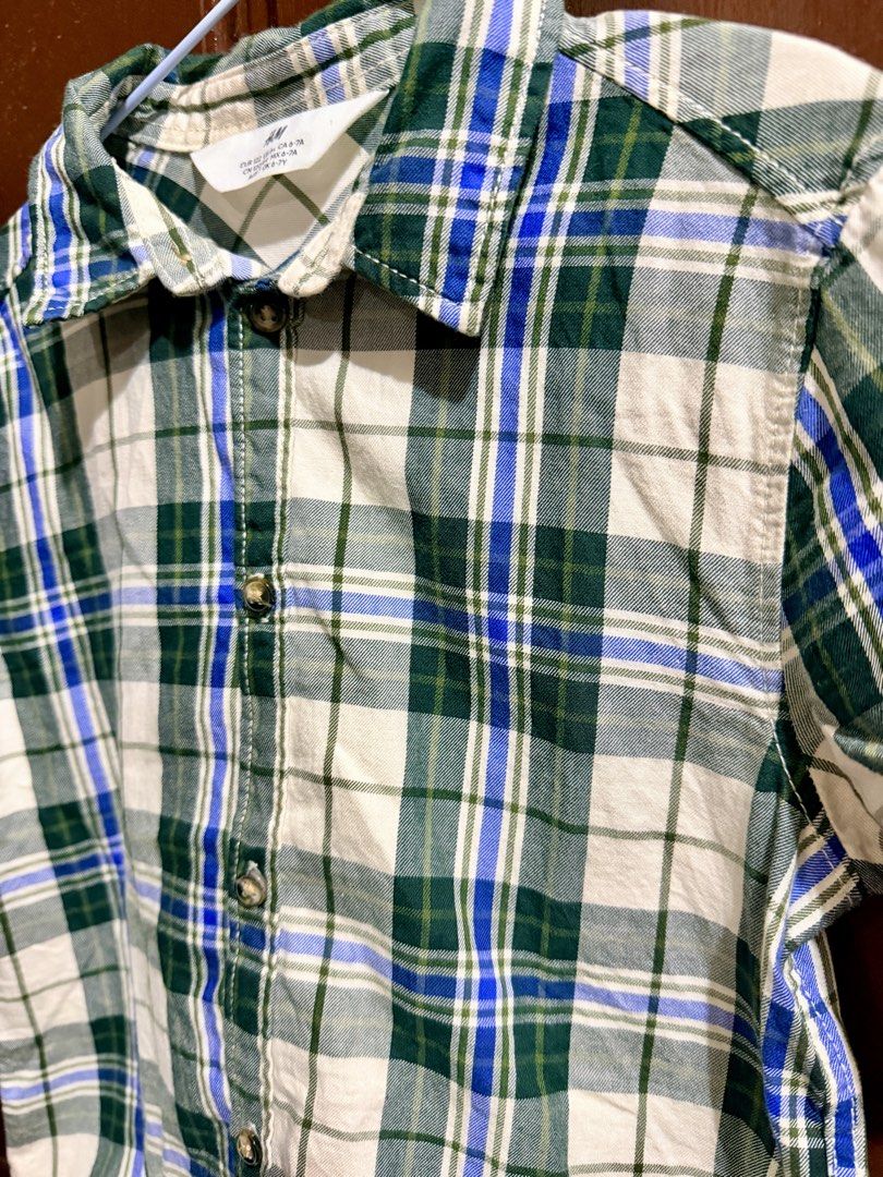 Pre-loved H&M Polo for Boys (Category: Babies & Kids Fashion) located in Muntinlupa City. Submitted by sashaloves (Listing ID 1470105331, Image 3). Description: Pre-loved H&M Polo for Boys Size on tag: 6-7Y Complete buttons In good used condition Please manage your expectations. You are considering a used item. MOP: BPI | GCash | Maribank No COD/COP. SF c/o buyer..