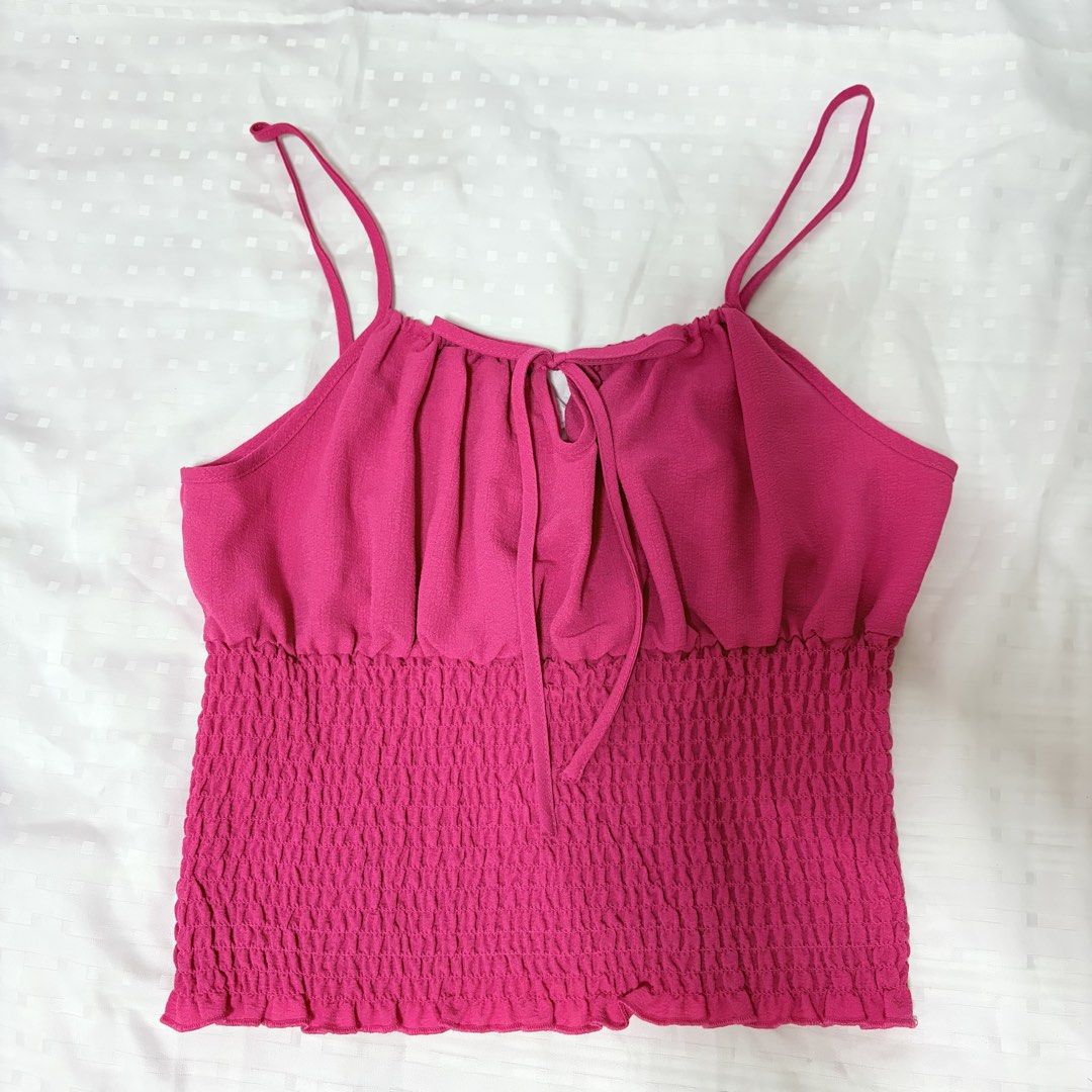 Primark Pink Smocked Tank Top (Category: Sleeveless) located in Marikina City. Submitted by pial21 (Listing ID 1470000489, Image 1). Description: Primark Pink Cami Smocked Top Size small Never used.