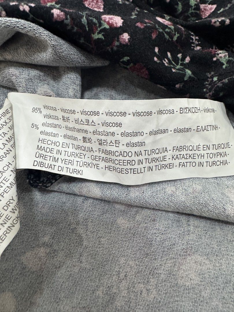 Pull & Bear Floral Black Dress Size XS (Category: Dresses) located in Dagupan City. Submitted by truehawk.c51029 (Listing ID 1470090793, Image 3). Description: - Brand: Pull & Bear - Size: XS - Color/Pattern: Black with pink and green floral print - Material: 95% viscose, 5% elastane (super soft and stretchy) - Features: Three-quarter sleeves, keyhole neckline cutout - Condition/Style: Great everyday piece, easy to throw on and style.