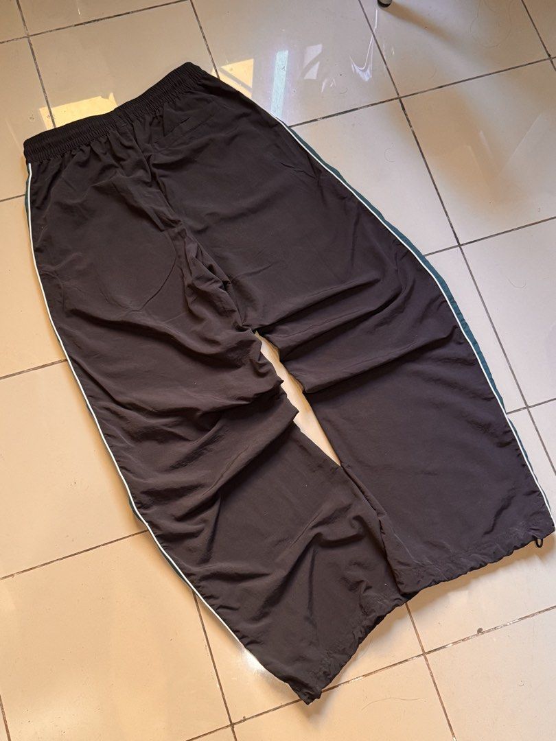 Puma Black Green Track Pants Size S (Category: Joggers) located in Manila. Submitted by leey0ww (Listing ID 1470030524, Image 3). Description: Puma track pants ₱600 No issues Adjustable leg opening Size: small Last pics for measurements Loc: Youniversity suites recto avenue manila.