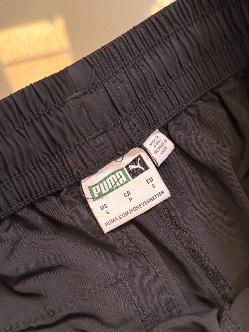 Puma Black Green Track Pants Size S (Category: Joggers) located in Manila. Submitted by leey0ww (Listing ID 1470030524, Image 2). Description: Puma track pants ₱600 No issues Adjustable leg opening Size: small Last pics for measurements Loc: Youniversity suites recto avenue manila.