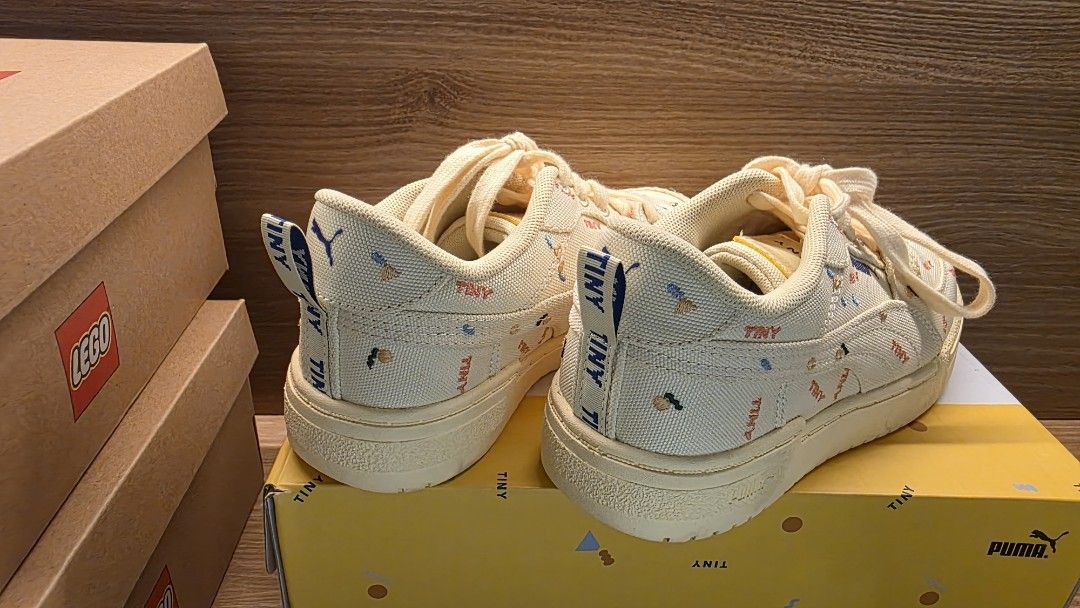Puma x Tinycottons CA Pro Tiny AOP PS Aspen Gold Kids (Category: Babies & Kids Fashion) located in Muntinlupa City. Submitted by olxph_822360203 (Listing ID 1470033796, Image 3). Description: - Brand: Puma x Tinycottons CA Pro Tiny - Color: Aspen Gold - Size: US 1C / UK 13 / EUR 32 / 19 cm - Material: Canvas upper with all-over embroidered Tinycottons motifs - Features: Thick laces, heel pull tab - Condition: Brand new in original branded shoebox