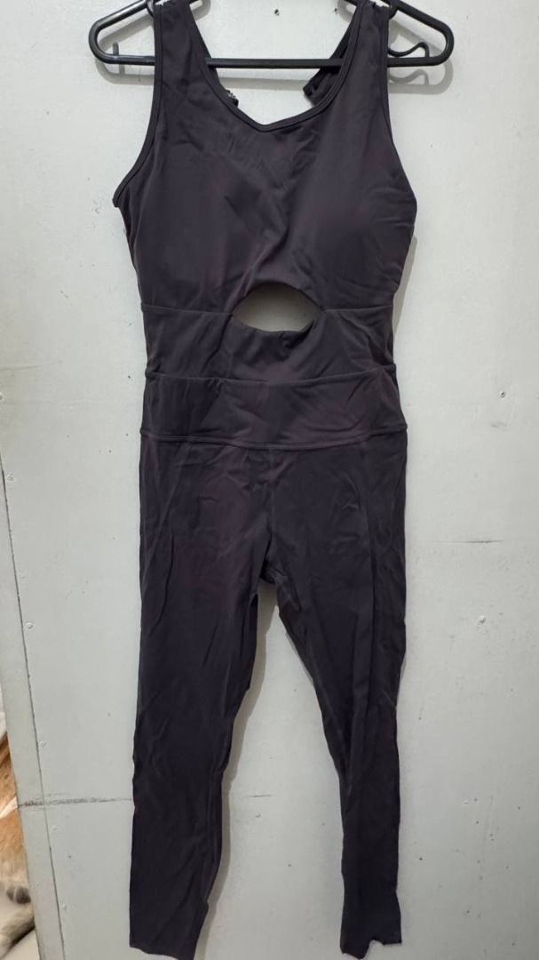 Purple Jumpsuit Workout Romper with Cutout Back (Category: Jumpsuits) located in Santa Rosa. Submitted by sherikasstuff (Listing ID 1469957958, Image 1). Description: - Style: Cut-out athletic one-piece jumpsuit - Features: Built-in padding, chic front midriff cutout, and sexy cutout back detail - Comfort: Stretchy fabric for maximum mobility during pilates or yoga - Versatility: Full-length attached leggings, easy to slip on and off for the gym 