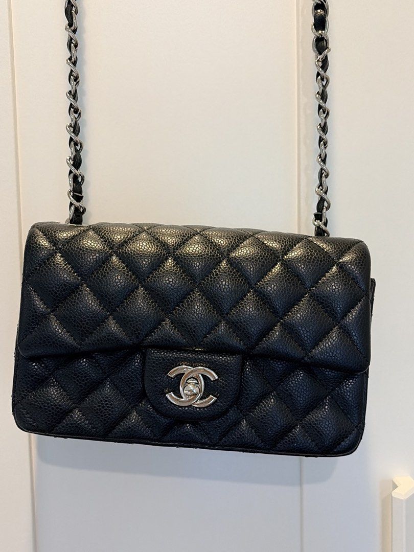 Quilted Black Leather Flap Bag (Category: Luxury Bags & Wallets) located in Manila. Submitted by rd_sell (Listing ID 1470028946, Image 1). Description: - No brand - Material: Quilted Caviar Leather - Color: Classic Black - Hardware: Silver-tone with signature turn-lock closure - Strap: Interwoven chain shoulder strap - Features: Structured shape, diamond quilting pattern, and convenient rear slip pocket - Inclusion: Original black fabric dust bag