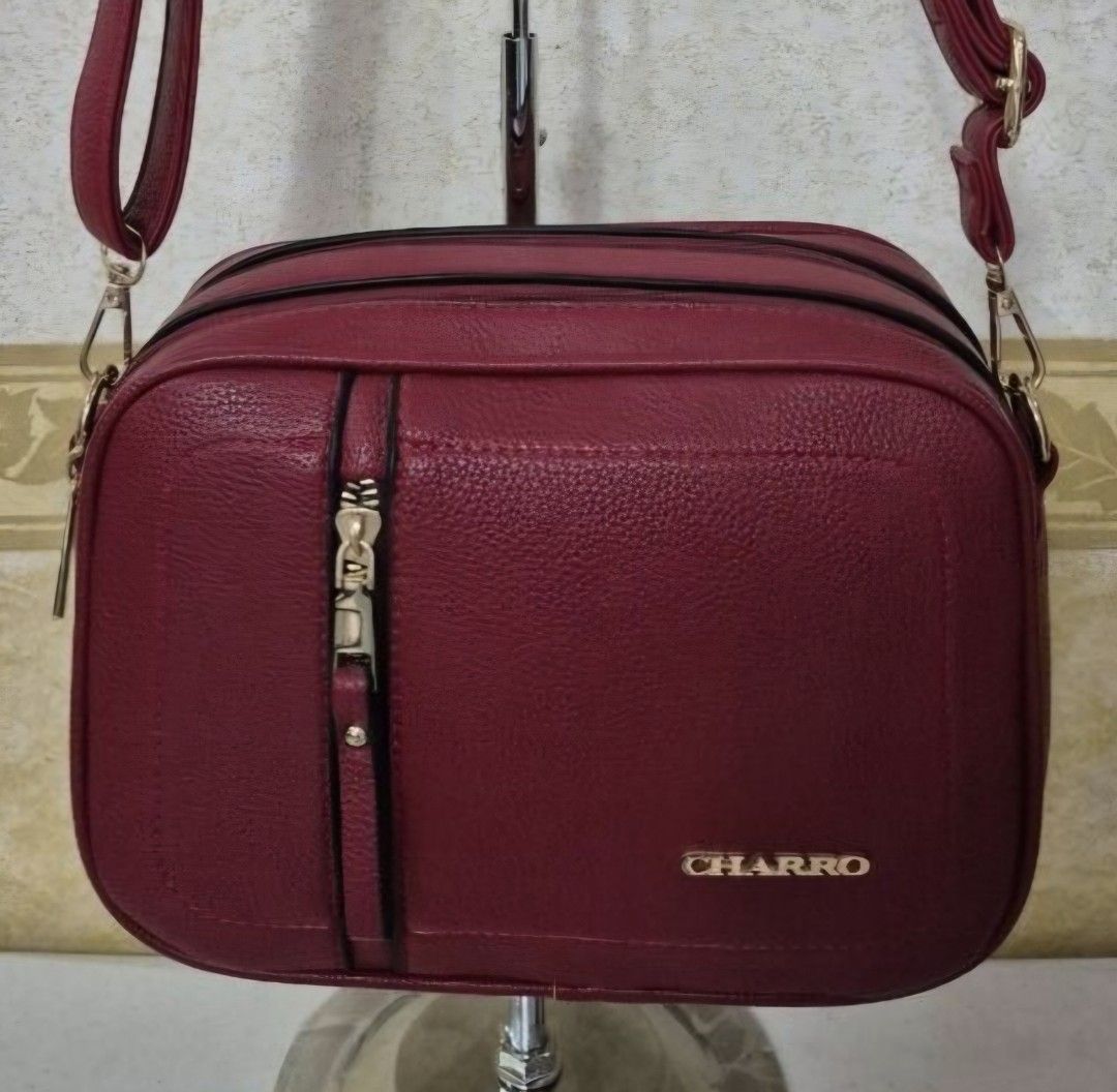 R11-590 CHARRO RED MULTIPOCKET SHOULDER BAG AND SLING BAG (Category: Cross-body Bags) located in Valenzuela. Submitted by dailyhappyfinds (Listing ID 1469986127, Image 1). Description: BRAND: Charro -Brand new without tag -Shoulder bag and sling bag *Mall pullout/ factory pullout. Please manage your expectations. .
