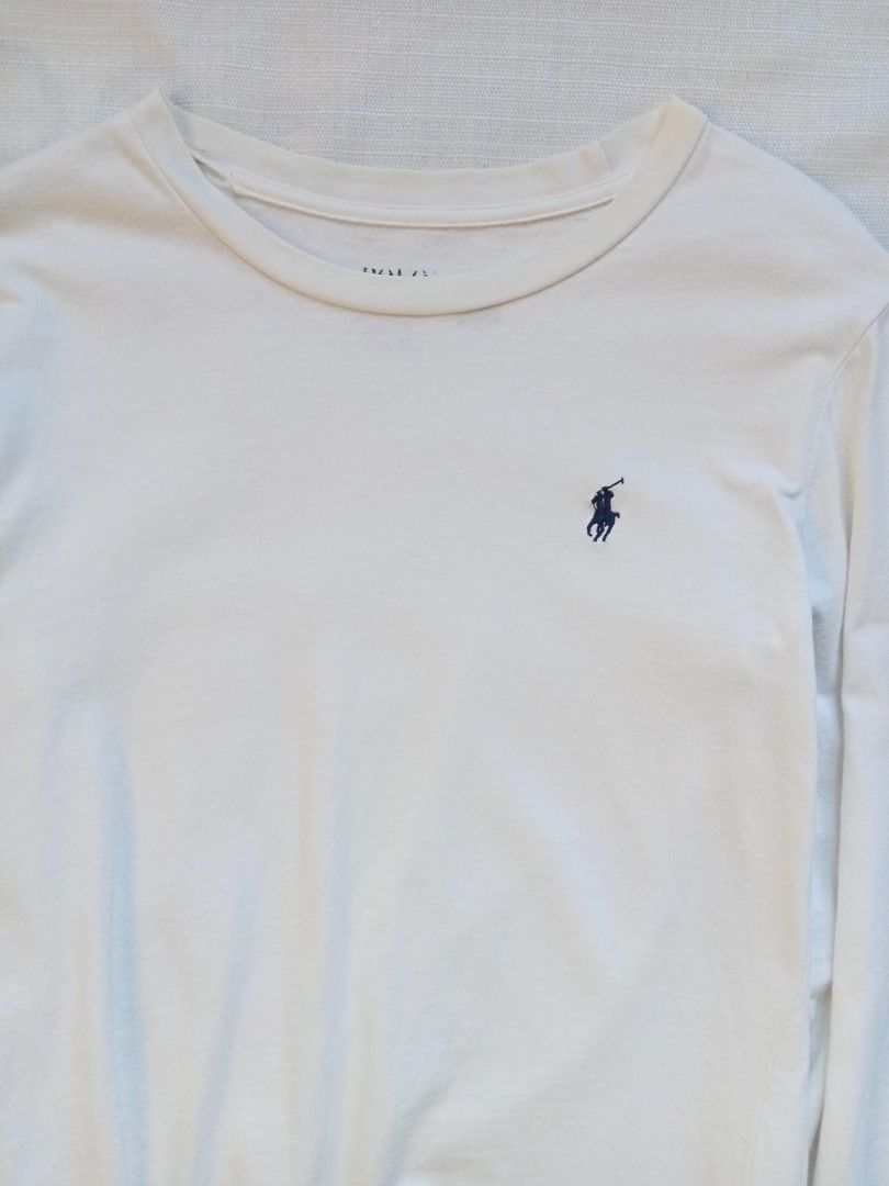 Ralph Lauren white longsleeve for her (Category: Longsleeves) located in Bagabag. Submitted by thrift_stories96 (Listing ID 1470099742, Image 2). Description: Ralph Lauren white longsleeve for her Small on tag fits medium Length - 24 Width - 18 Condition - 9/10 Normal sign of use by previous owner No major flaw.