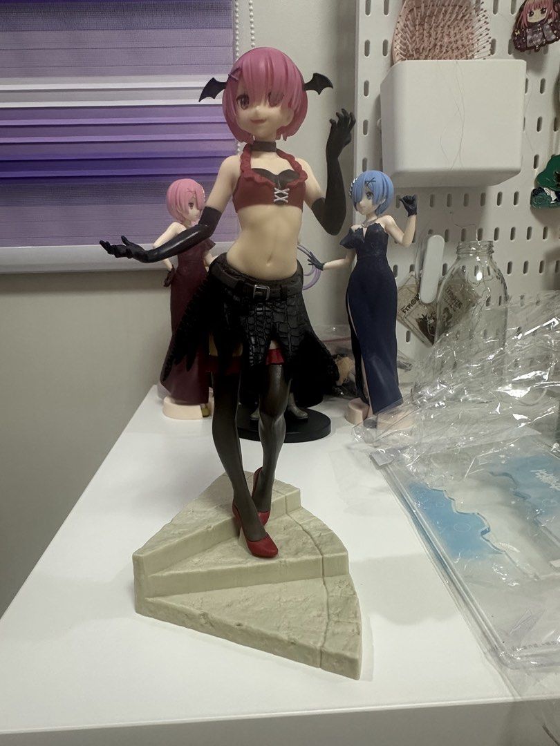 Ram vampire figure (Category: Figurines & Statues) located in Manila. Submitted by silentfire.54ea36 (Listing ID 1470115589, Image 1). Description: - Character: Anime figure with pink hair - Outfit: Red crop top, black gloves, and dark skirt - Base: Textured stone-like staircase - Condition: Mint, collected from a clean, dust-free display shelf - Note: Background figures not included.