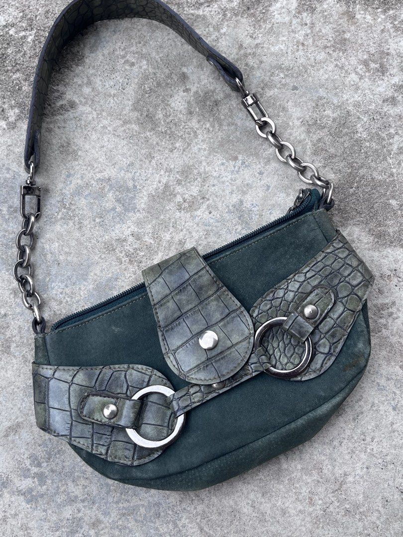 Random y2k shoulder bag (Category: Shoulder Bags) located in M'Lang. Submitted by sourcevtg_thrft (Listing ID 1469959717, Image 3). Description: - dark green shoulder bag - suede-like body - faux-crocodile leather trim, silver-tone O-ring hardware, snap-tab front closures, and a chain-and-leather shoulder strap..
