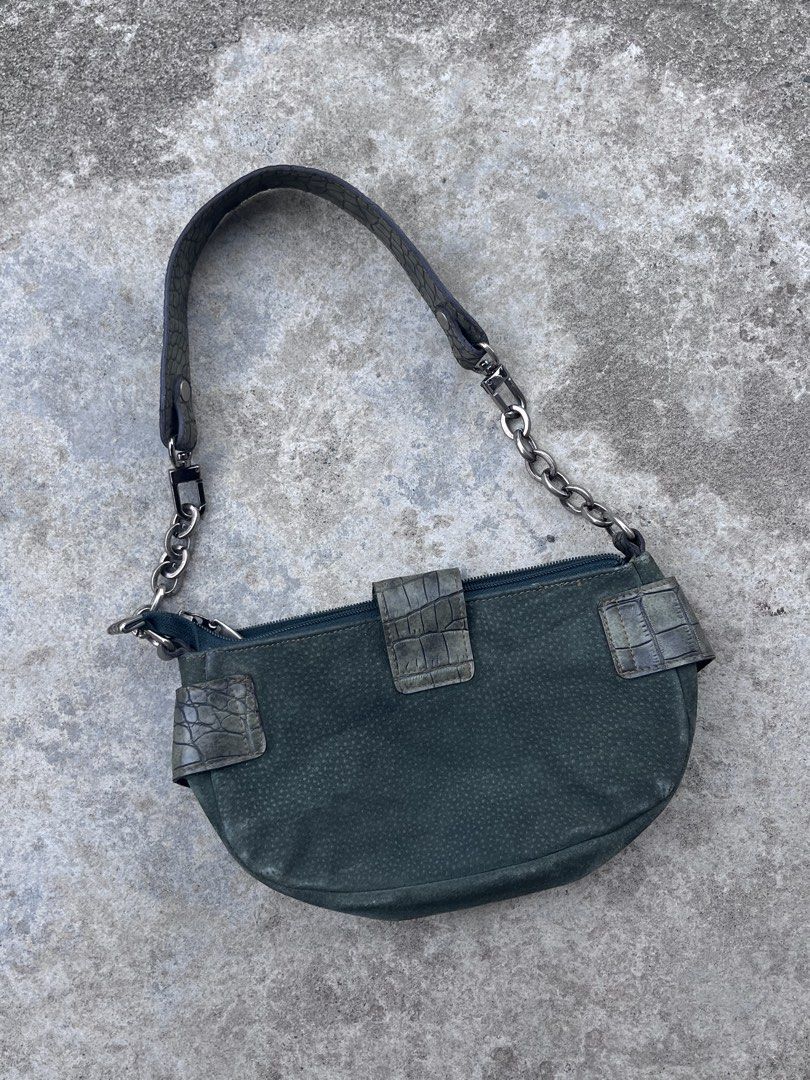 Random y2k shoulder bag (Category: Shoulder Bags) located in M'Lang. Submitted by sourcevtg_thrft (Listing ID 1469959717, Image 2). Description: - dark green shoulder bag - suede-like body - faux-crocodile leather trim, silver-tone O-ring hardware, snap-tab front closures, and a chain-and-leather shoulder strap..