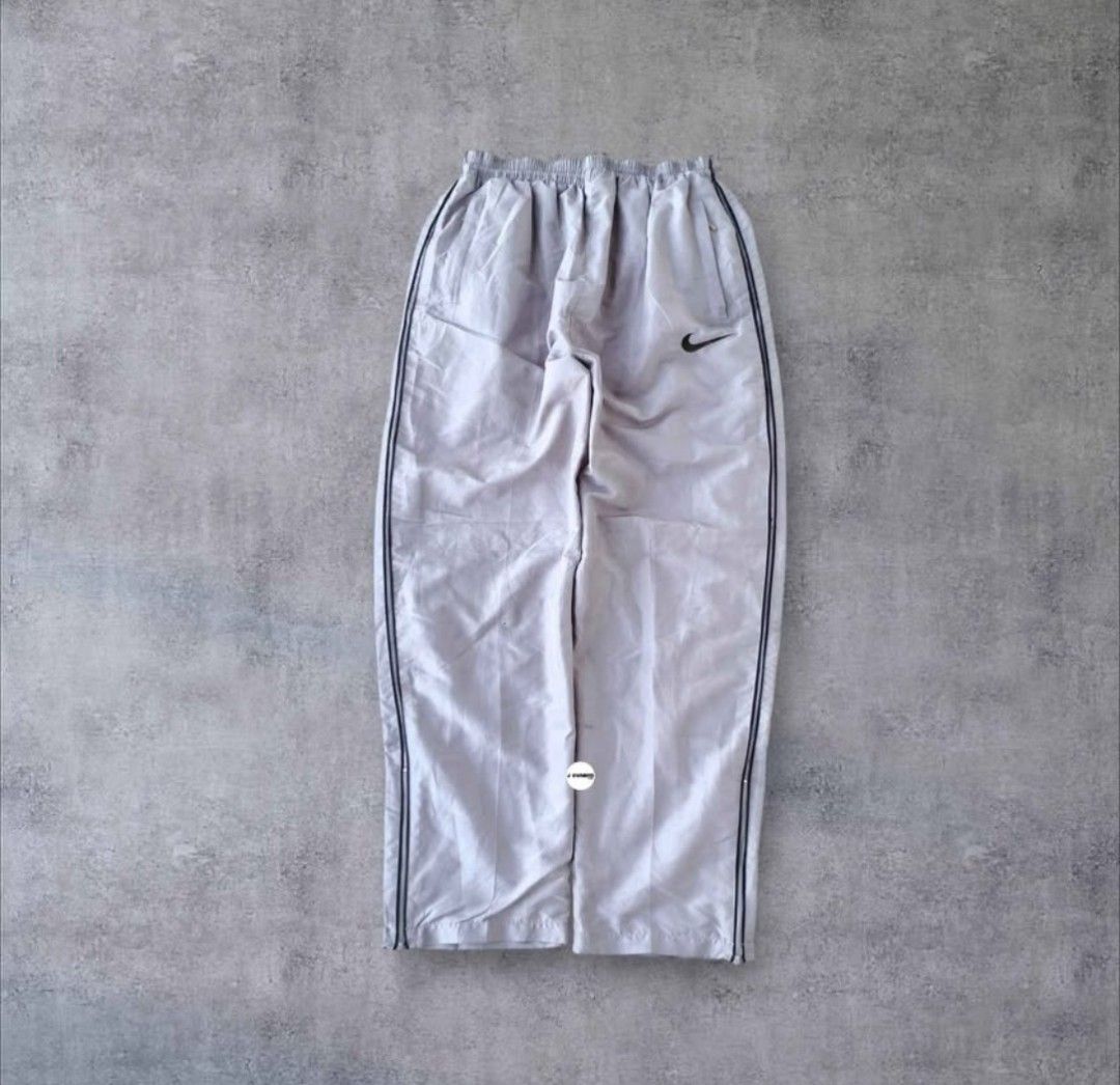 Rare Nike Trackpants Embroidered (Category: Activewear) located in Pasig City. Submitted by j.ownerss (Listing ID 1469994248, Image 2). Description: FOR SALE‼️ RARE NIKE TRACKPANTS‼️ ₱650 ONLY (FROM 700) Logo Embroidered 3 pockets Double lining With ankle zip Condition: 9/10 Flaws: cut tags, loose stitching and very minimal pinhole (unnoticeable, refer to last 2 slides) Waistline: 20-38 Length: 40 Hem: 8 Pickup: Allegra Garden Place Pasig Deliver