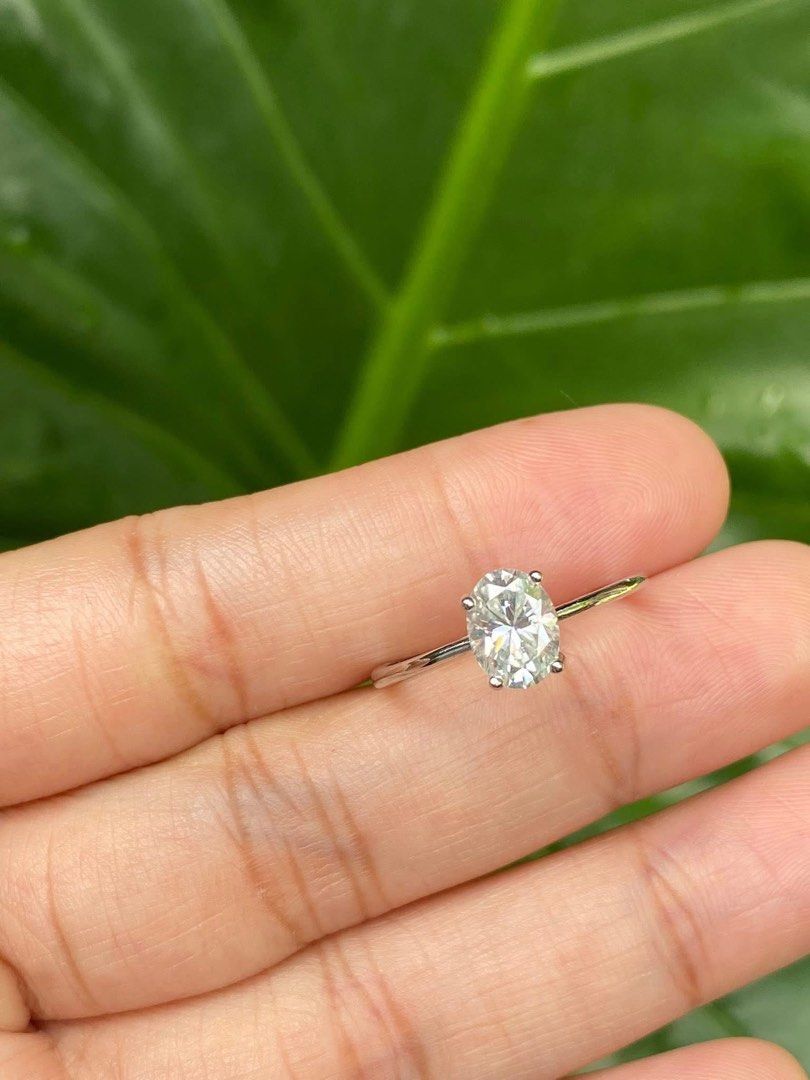 Real moissanite oval cut titanium setting adjustable size (Category: Rings) located in Kalibo. Submitted by sunnysidegold (Listing ID 1469961414, Image 2). Description: Real moissanite oval cut adjustable setting titanium setting non tarnish Videos available upon request.