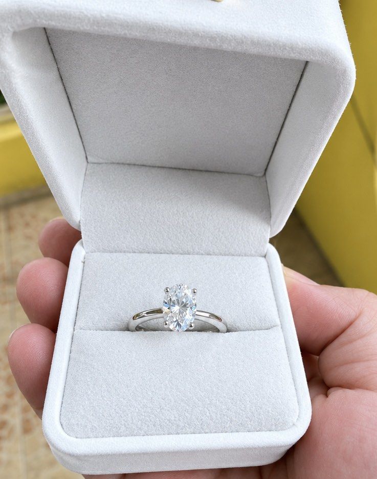 Real moissanite oval cut titanium setting adjustable size (Category: Rings) located in Kalibo. Submitted by sunnysidegold (Listing ID 1469961414, Image 1). Description: Real moissanite oval cut adjustable setting titanium setting non tarnish Videos available upon request.