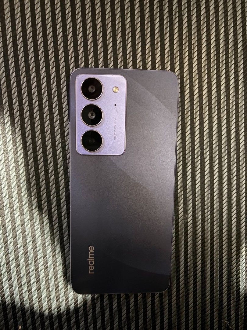 Realme gaming phone (Category: Realme) located in Manila. Submitted by vastfire (Listing ID 1470001502, Image 1). Description: Selling my realme gaming phone. Halos di na nagagamit. Mag one year pa lang! Rfs: Tatlo yung phone ko at yung Iphone 17 lang yung lagi kong ginagamit..